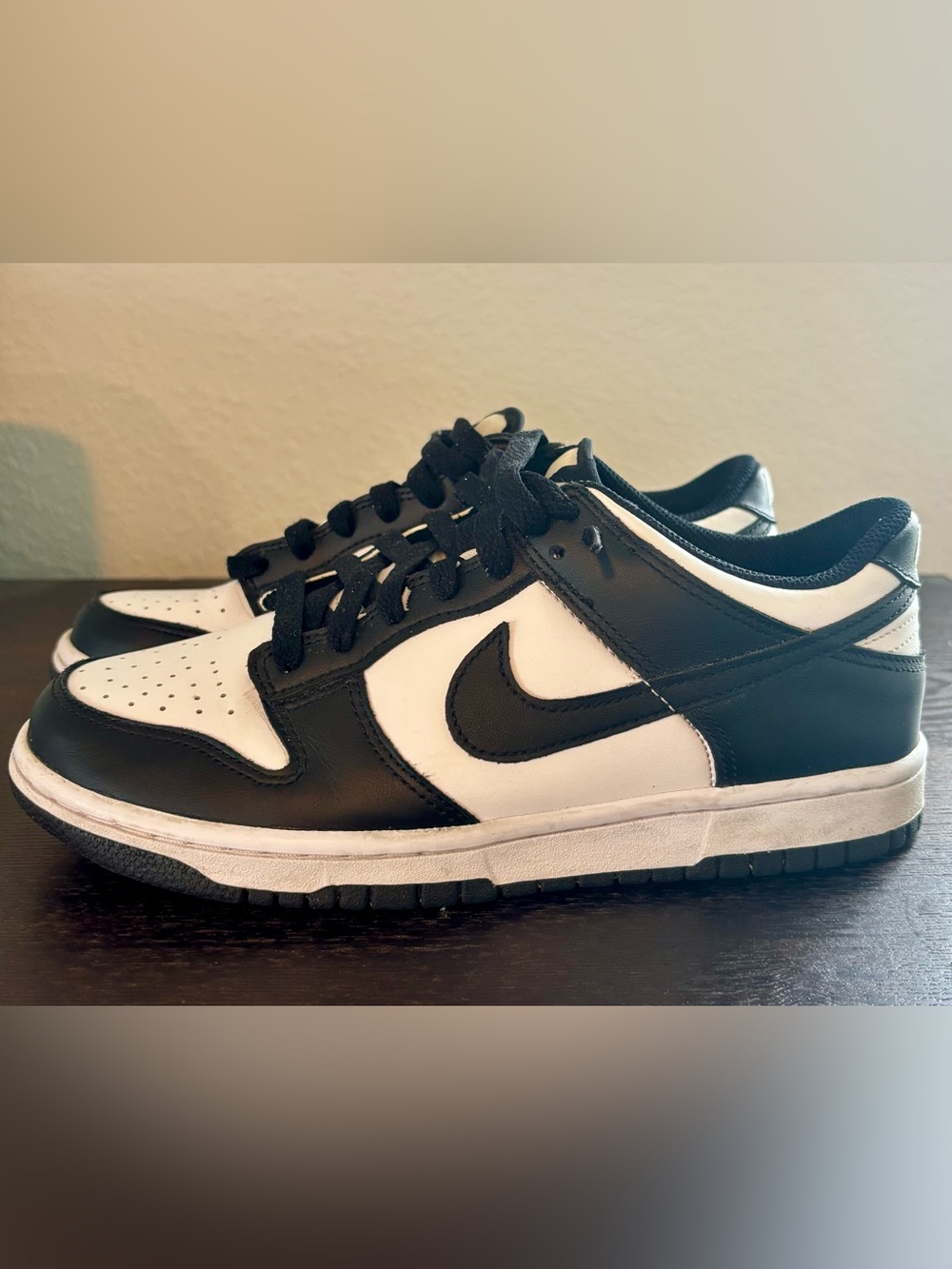 Nike Black and White Dunk Low Panda Sneaker with Swoosh Accent